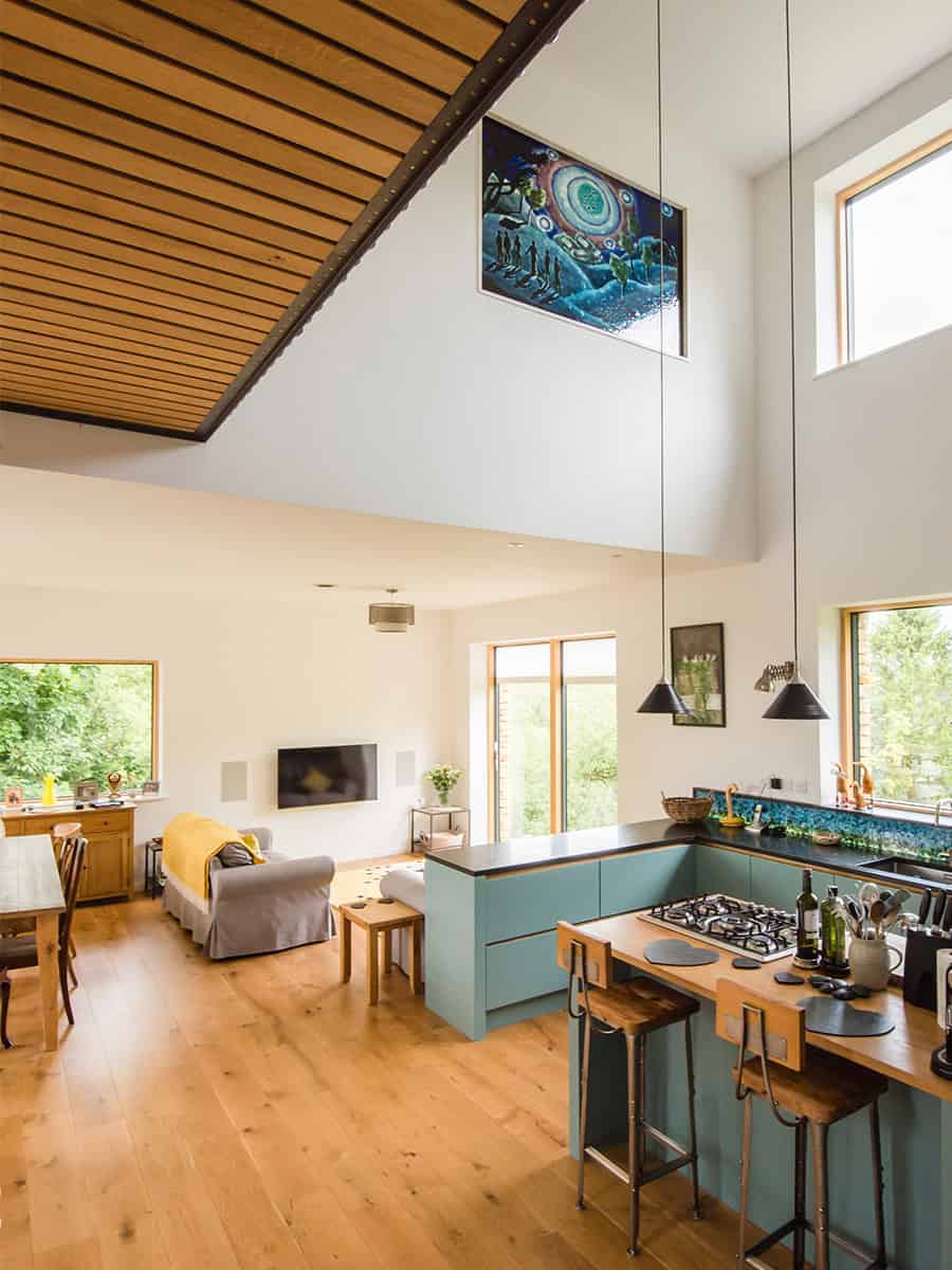 Harleywood House double-height open-plan kitchen and living area with vaulted timber ceiling